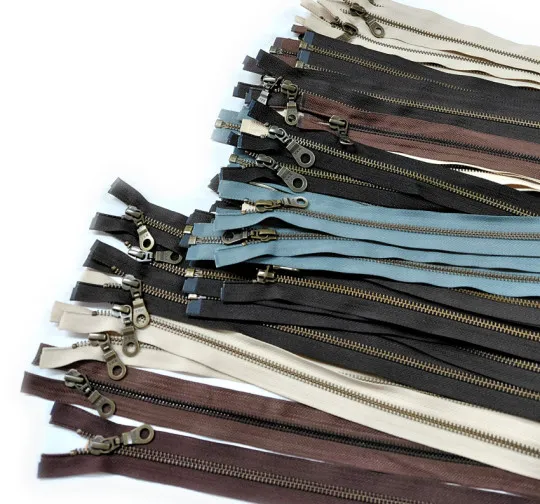 KONVOLUT: Metall-Reißverschlüsse teilbar 37 Stück