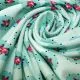 50cm Jerseystoff Retroblumen mint